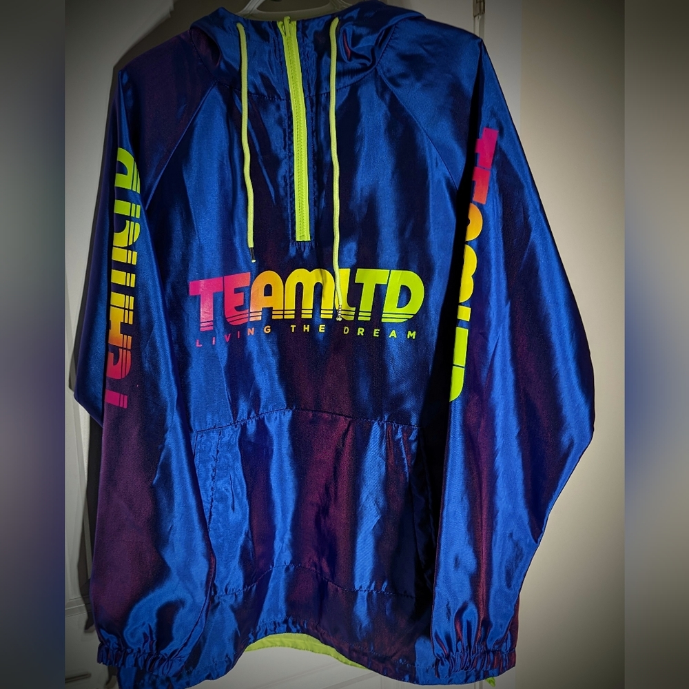 Team Ltd half zip reverseable pull over